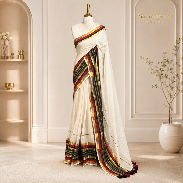 White mulcotton saree with multicolour gold